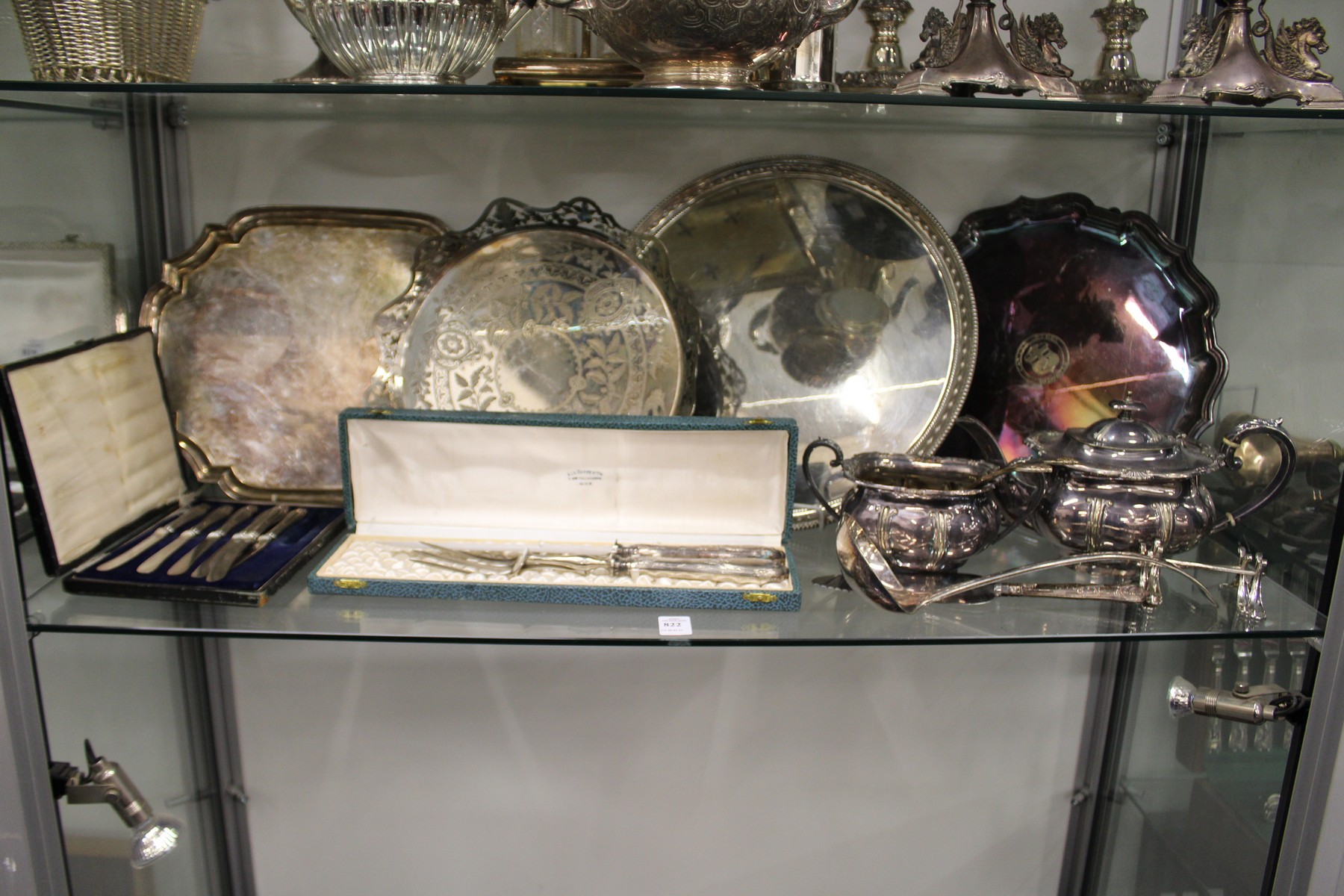 Various plated salvers and other items.