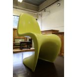 In the manner of Verner Panton, a moulded fibreglass chair.