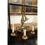 A Dutch style brass six branch chandelier.