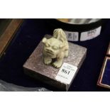 A Chinese carved soapstone lion dog seal.