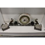 An Art Deco marble clock garniture.