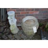 A reconstituted stone garden pot and a pot stand.