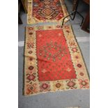 A small flat weave Kilim rug.