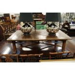 An unusual elm and bamboo large low table with folding X-shaped frame.