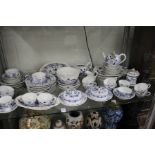 A large quantity of Meissen onion pattern style porcelain.