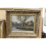 'Rural River Landscape with a Cottage' oil on canvas, in a decorative gilt frame.