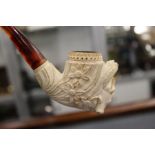 A cased Meerschaum pipe.