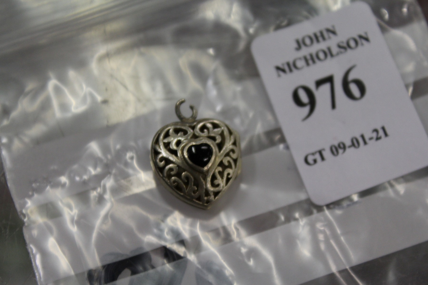 A heart shaped pendant.