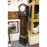An oak cased grandmother clock.