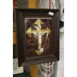 A framed and glazed crucifix.