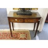 A mahogany two drawer bow fronted side table.