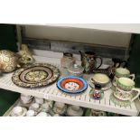 A quantity of Swiss Thoune decorative pottery items to include a ewer, various mugs, plates etc.