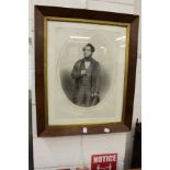 An engraved portrait of a gentleman in a mahogany frame.