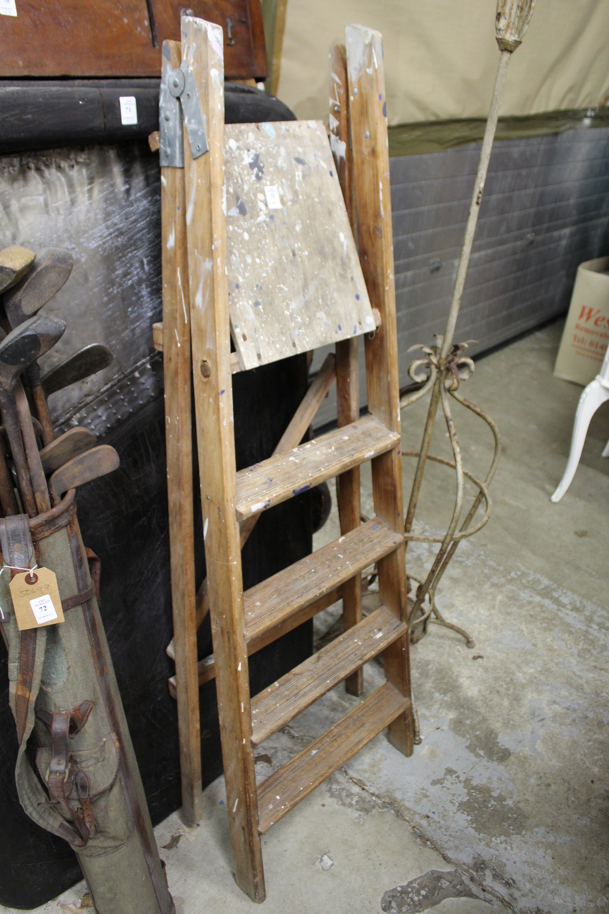 A wooden step ladder.