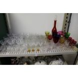 Cut glass champagne glasses, colourful glassware etc.