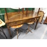 A modern hardwood three drawer side table.