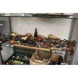 A good collection of shooting related items to include copper powder flasks, gun rack etc. etc.