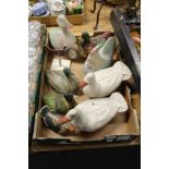 Carved wood and painted models of ducks etc.