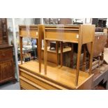 A pair of 1970's teak bedside tables.