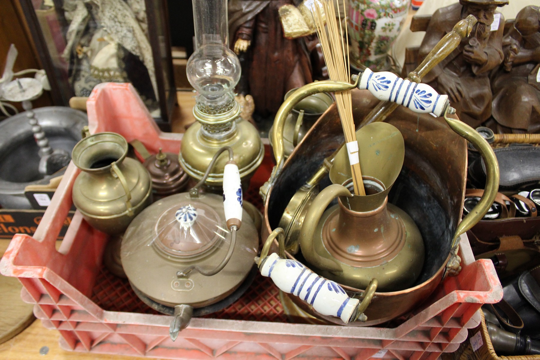 A quantity of copper and brass ware.