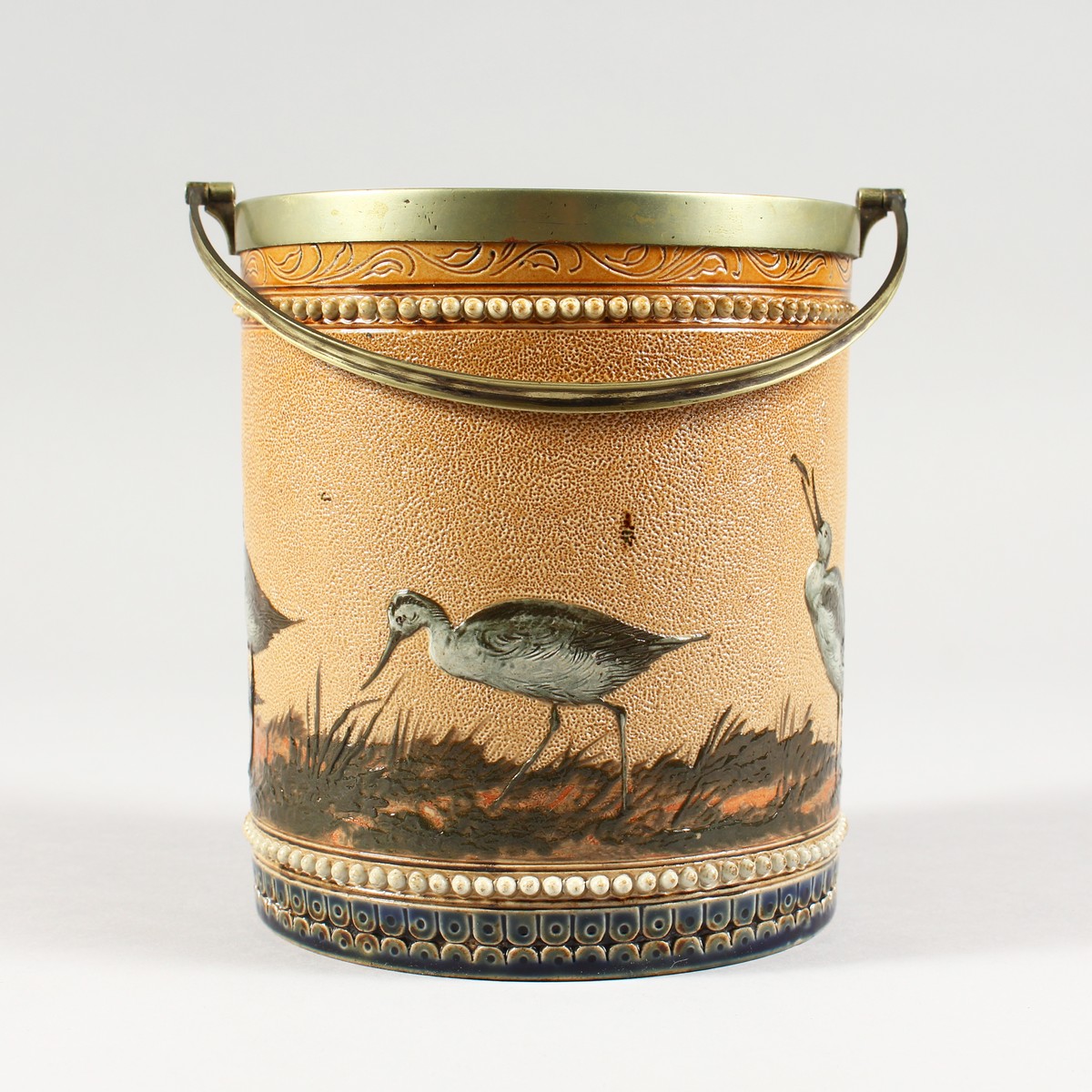 A GOOD DOULTON LAMBETH STONEWARE BISCUIT BARREL by FLORENCE E. BARLOW painted with birds. Maker F.