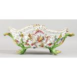 A GOOD MEISSEN OVAL PIERCED TWO-HANDLED BASKET, painted and encrusted with flowers with rustic