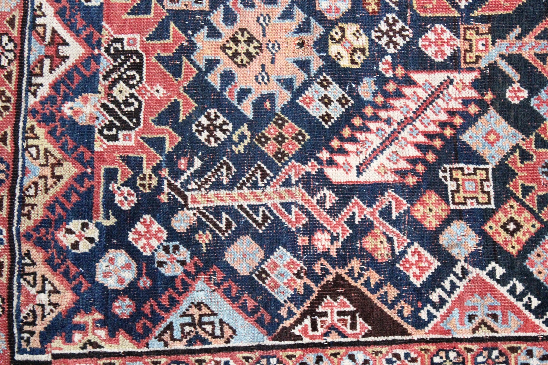 A PERSIAN QASHQAI RUG, early 20th century, dark blue ground with a central diamond shaped panel. 7ft - Image 3 of 6