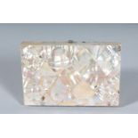 A GOOD VICTORIAN MOTHER-OF-PEARL PURSE with blue interior. 4ins x 2.75ins.