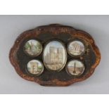 FIVE MINIATURES OF ROMAN BUILDINGS, set on the front of a purse. 2.5ins x 3.25ins.