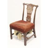 A CHIPPENDALE STYLE MAHOGANY SINGLE CHAIR, early 20th century, with carved cresting rail, pierced