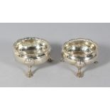 A PAIR OF CIRCULAR SALTS. London 1753 and 1760.