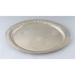 A HEAVY SILVER OVAL TEA TRAY. 18.5ins long. Sheffield 1905. Maker: Mappin & Webb. Weight 54ozs.