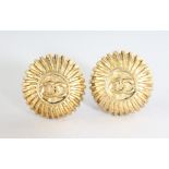 A PAIR OF CHANEL GILT EAR CLIPS.