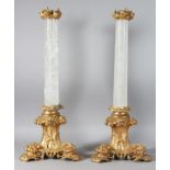 A SUPERB PAIR OF ROCK CRYSTAL AND ORMOLU LAMPS. 25ins high.