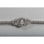 A SUPERB PLATINUM AND DIAMOND BRACELET.