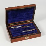 A MAHOGANY DRAWING INSTRUMENT FITTED BOX.