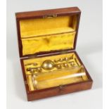 A HYDROMETER in a mahogany case, L. Lumley & Co.