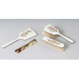 A FOUR PIECE SILVER AND ENAMEL DRESSING TABLE SET, mirror, two brushes and comb. Birmingham 1941.