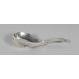 A GEORGE III BRIGHT CUT CADDY SPOON. London 1809.