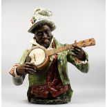 A SUPERB LARGE CONTINENTAL MAJOLICA PORCELAIN HALF-LENGTH FIGURE OF A MAN wearing a top hat and