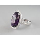 A GOOD 18CT WHITE GOLD, AMETHYST AND DIAMOND RING, approx. 19cts.
