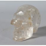 A CARVED ROCK CRYSTAL SKULL. 4.5ins.