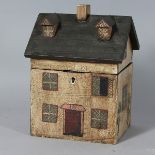 A REPRODUCTION HOUSE TEA CADDY. 8ins high.