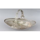 A STERLING SILVER PIERCED OVAL CAKE BASKET with handle. Weight 12ozs.