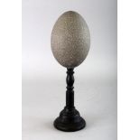 AN EMU EGG on a stand. 5ins.