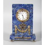 A SUPERB RUSSIAN FABERGE STYLE LAPIS AND SILVER CLOCK, with applied decoration, winged eagles and