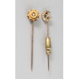TWO GOLD TIE PINS.