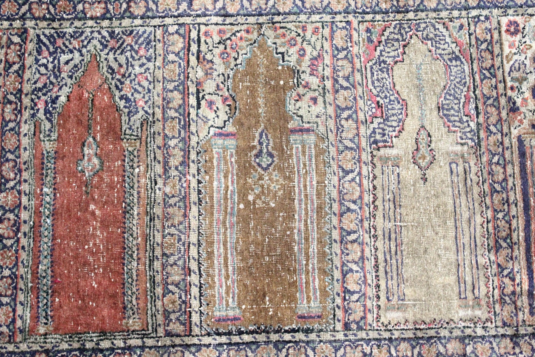 AN UNUSUAL PERSIAN PRAYER RUG, the central panel with eight arches and hanging lamps, within a - Image 8 of 10