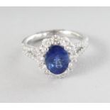 A SUPERB 18CT WHITE GOLD AND SAPPHIRE RING, 2.26, surrounded by 0.99 carats of diamonds.