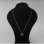 AN 18CT WHITE GOLD CHAIN WITH DIAMOND RING.